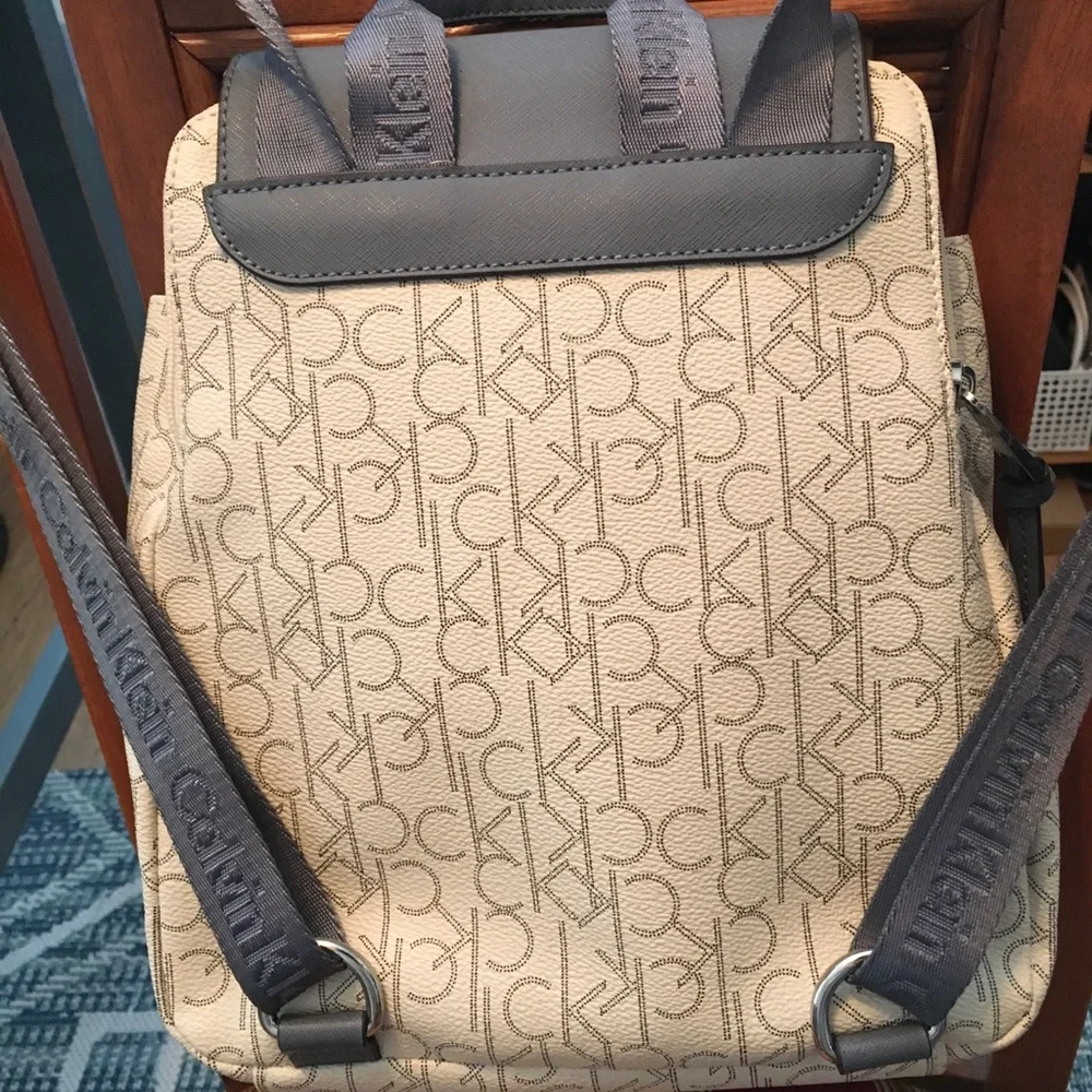 Calvin Klein Monogram Backpack with Blue/Gray Flap & Straps